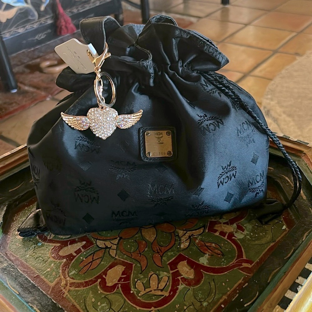 MCM Black Going Out Bag!! Sweet and Sexy. Drawstring with leather tassels.